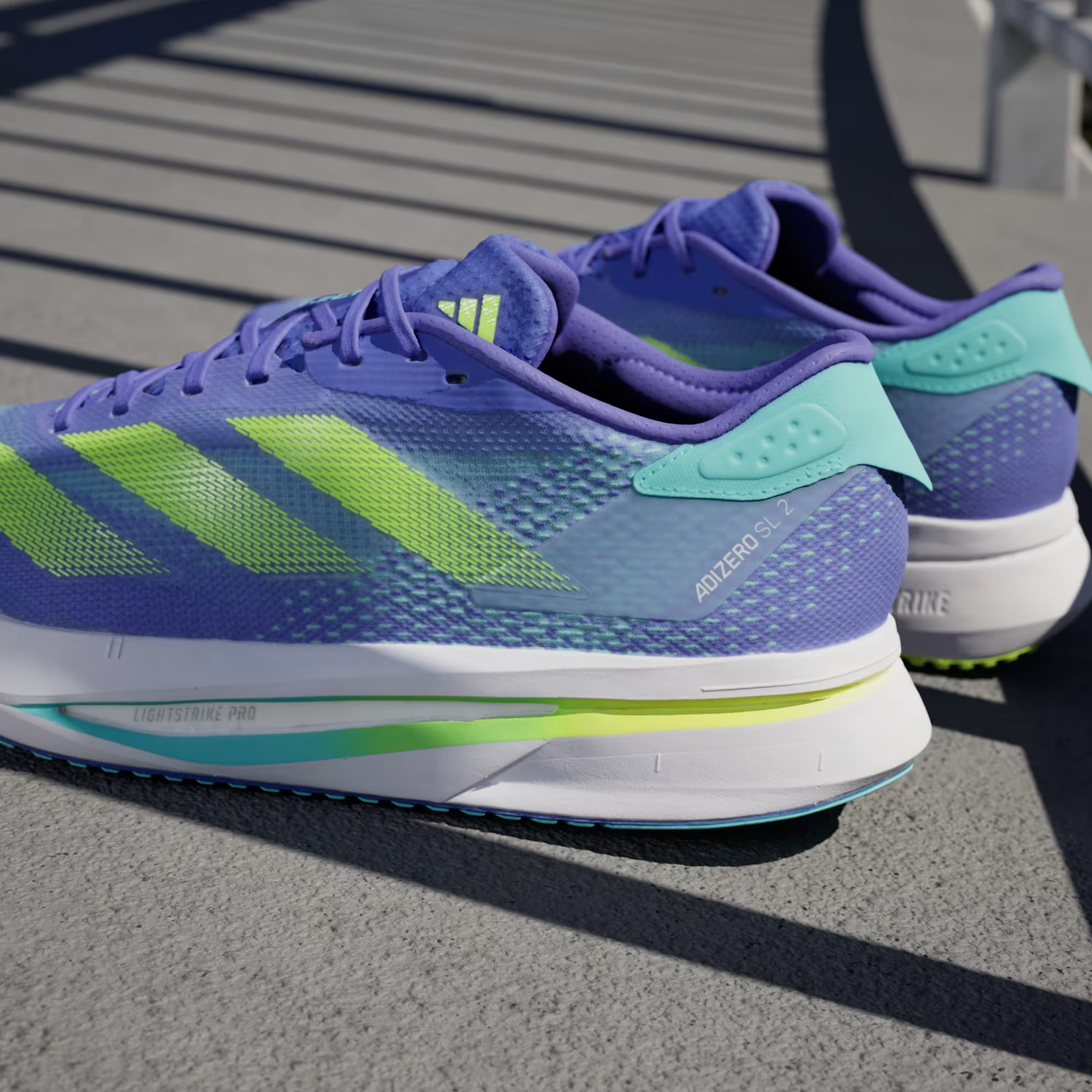 CORRIDA ADIZERO SL2 – ROXO Elegante