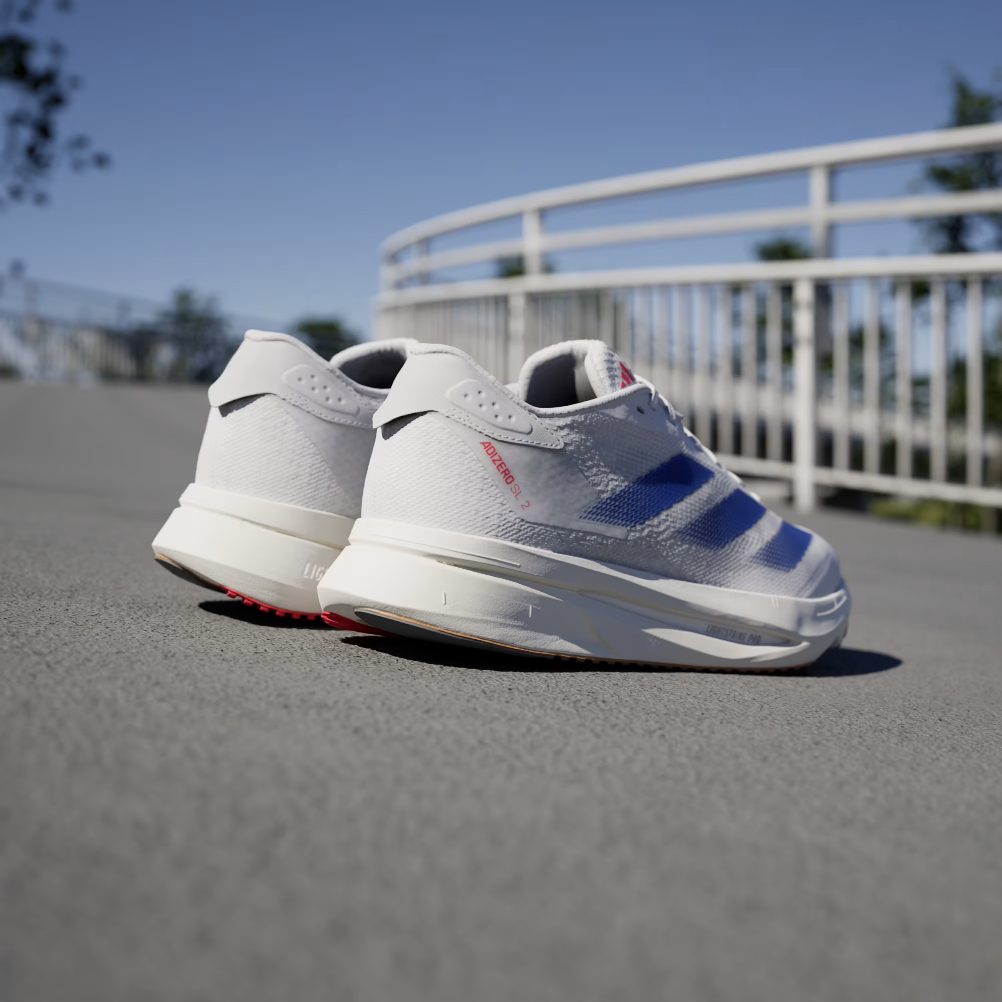 CORRIDA ADIZERO SL2 WHITE – BLUE Premium